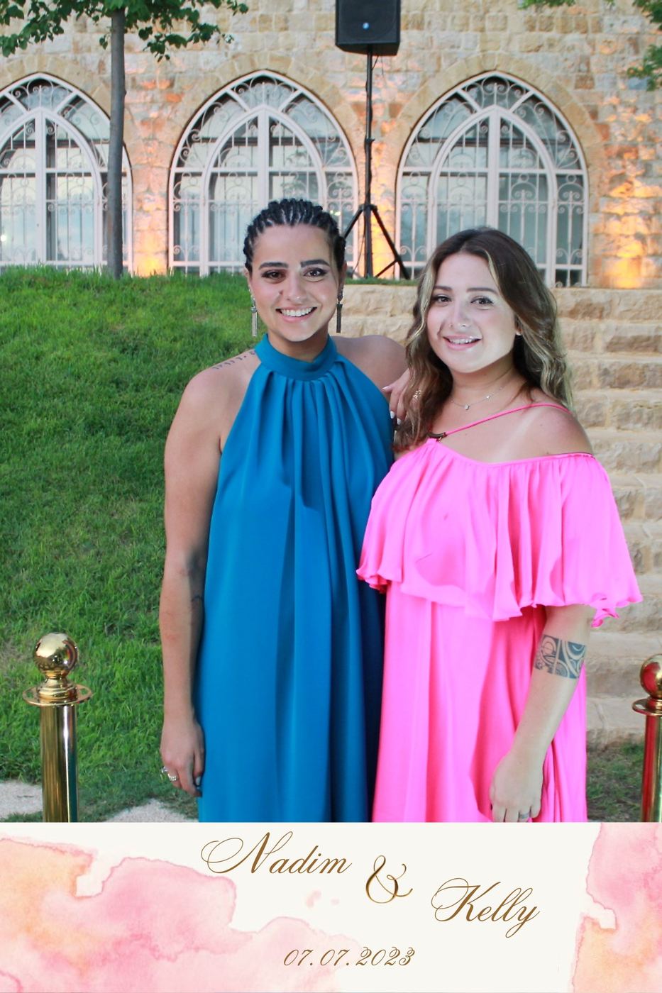 Guests smiling at a garden venue celebration