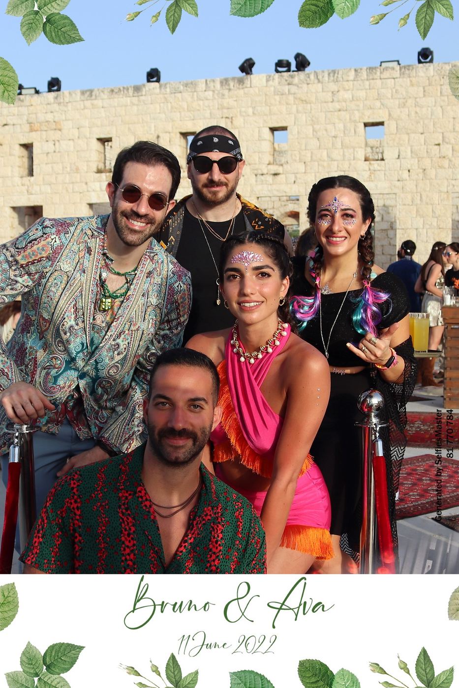 Guests in colorful outfits at an outdoor party