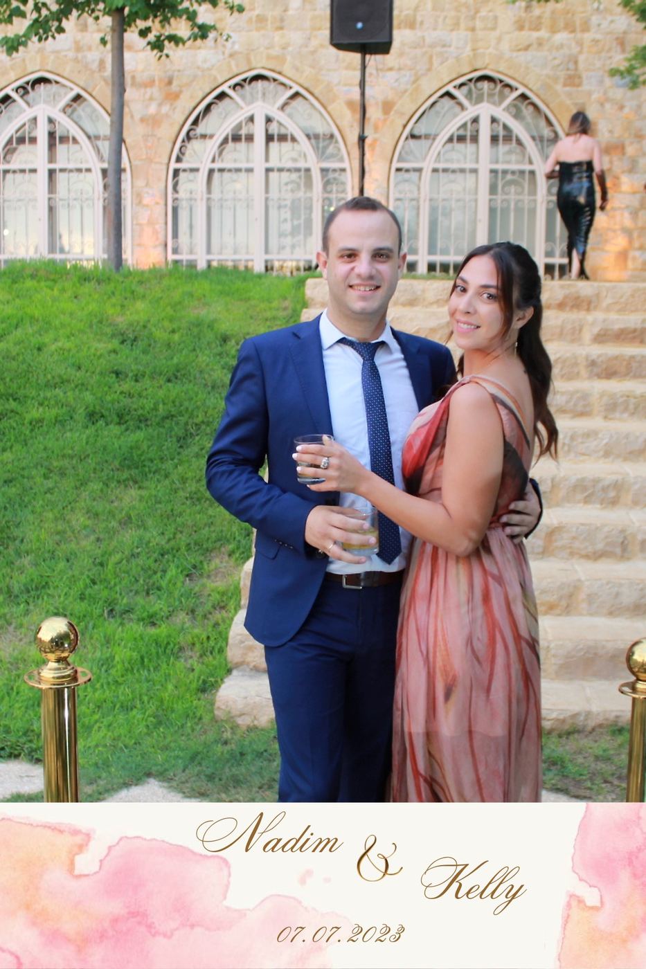 Couple toasting at a garden reception